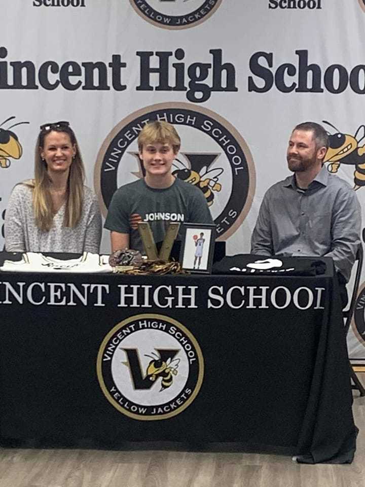 student signing